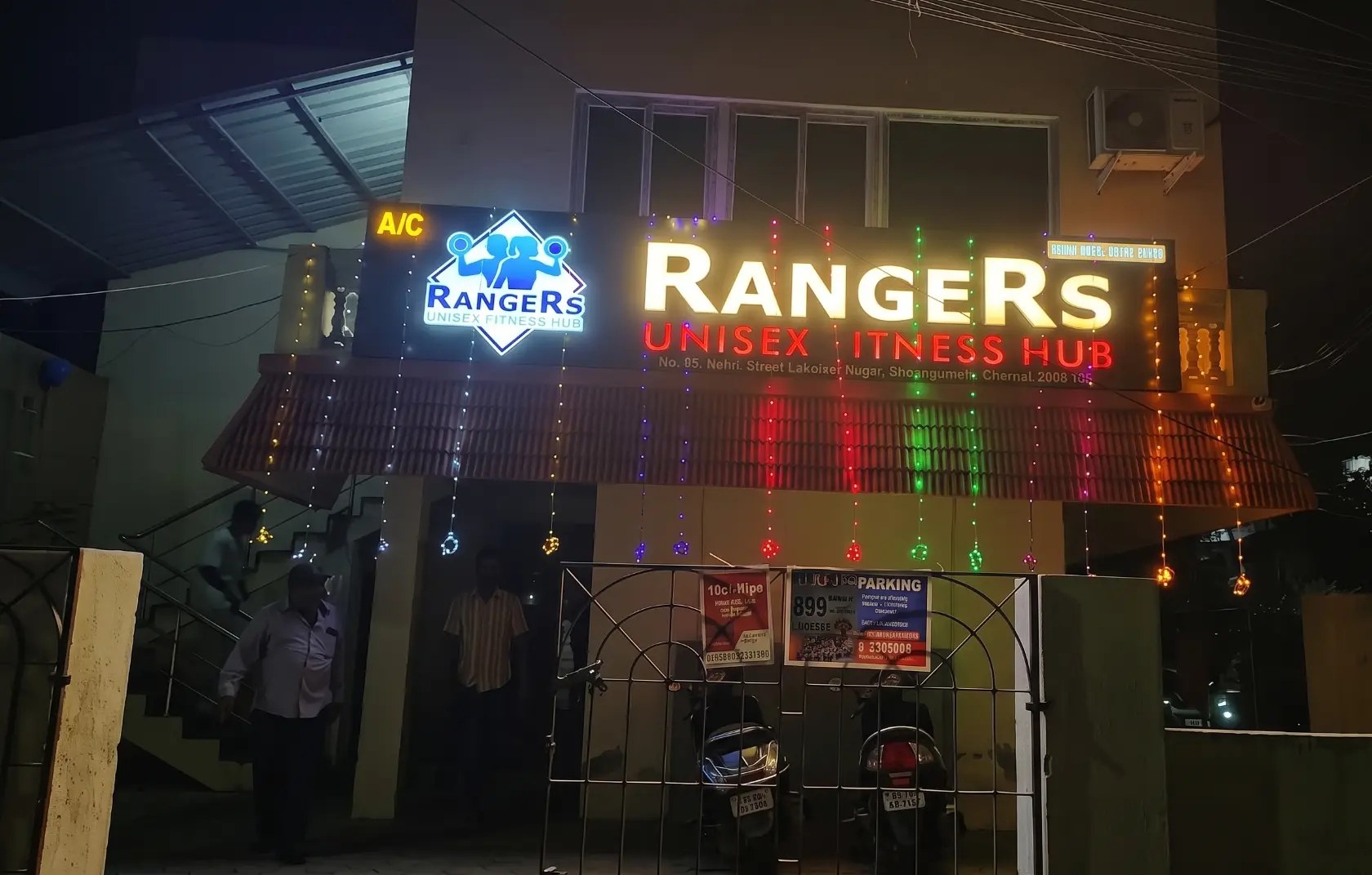 Rangers Fitness Gym entrance and signage at night in Sholinganallur