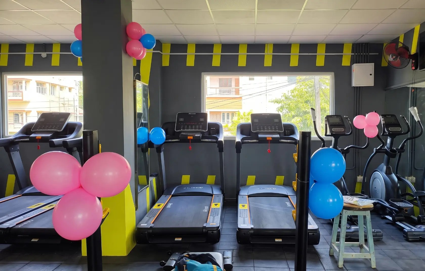 Ground floor cardio area with treadmills and elliptical machines